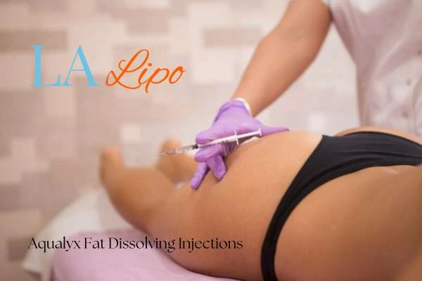 Woman having fat dissolving injections Upper Sydenham on thighs